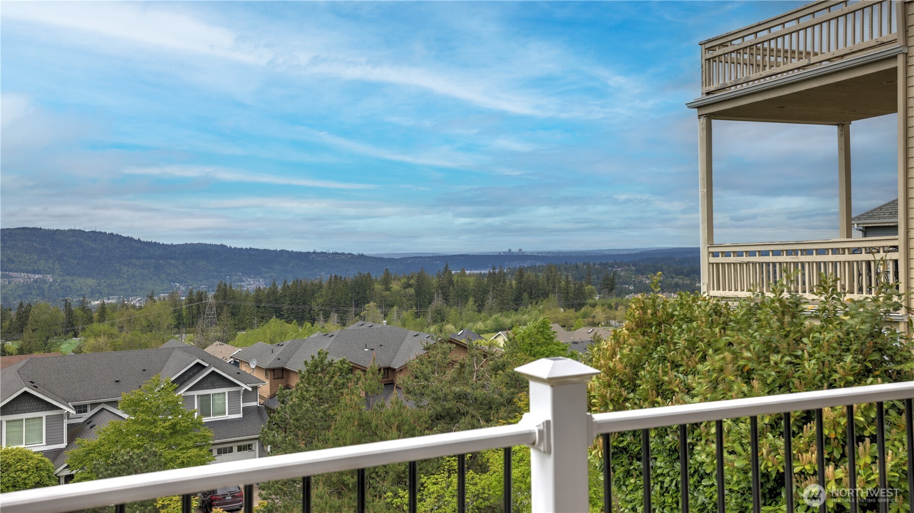 Extraordinary Skyline, Mountains and Lake Sammamish Views throughout all three levels.
