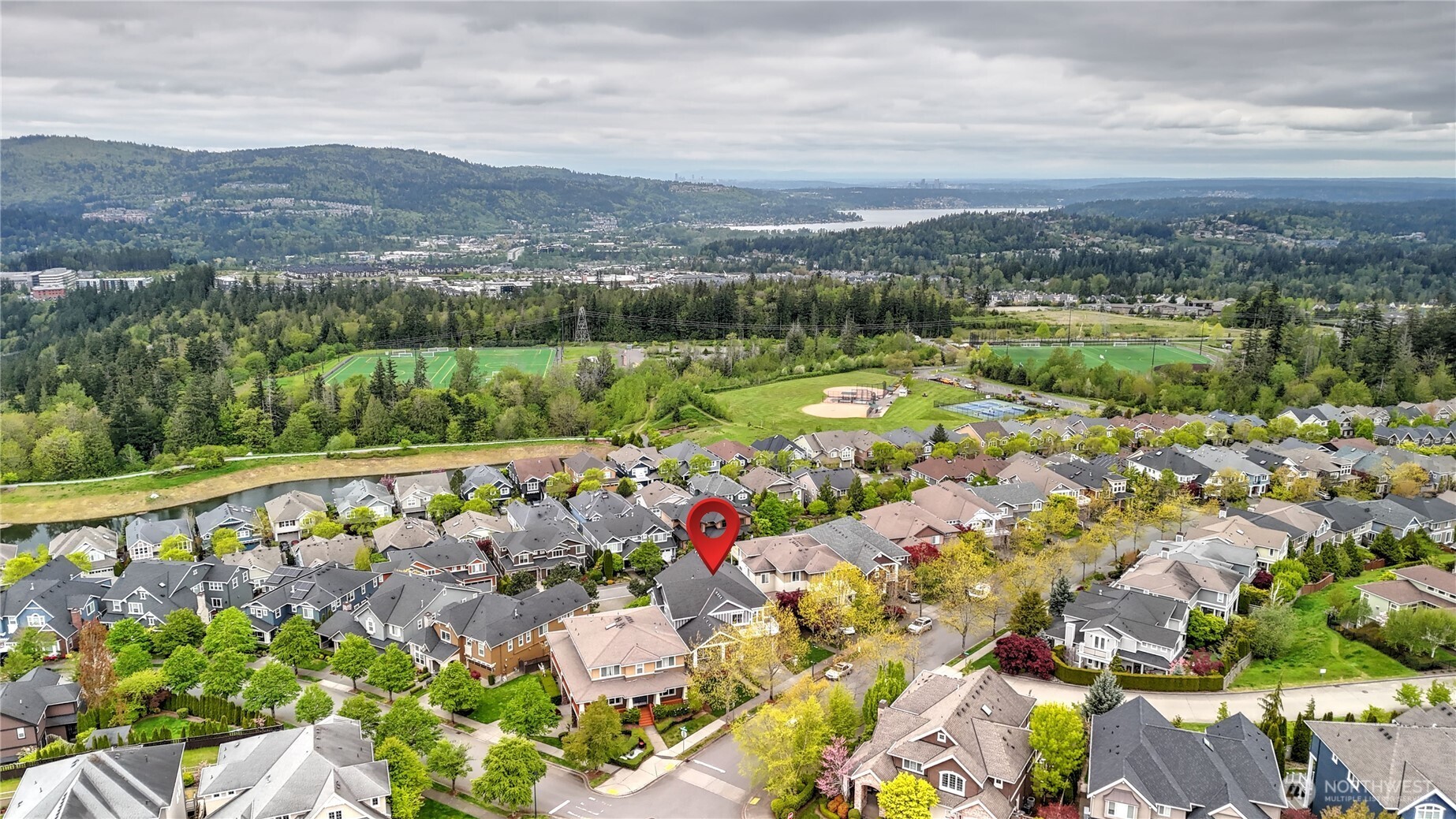 Extraordinary Skyline, Mountains and Lake Sammamish Views throughout all three levels.