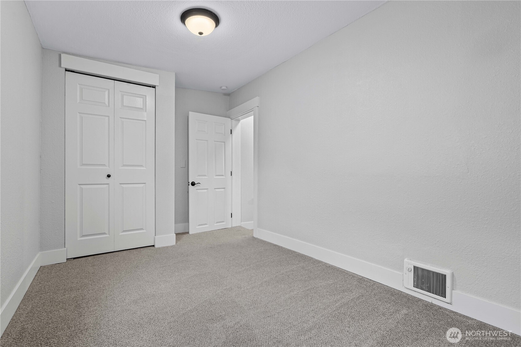 Bedroom #3 alternative view showing the closet