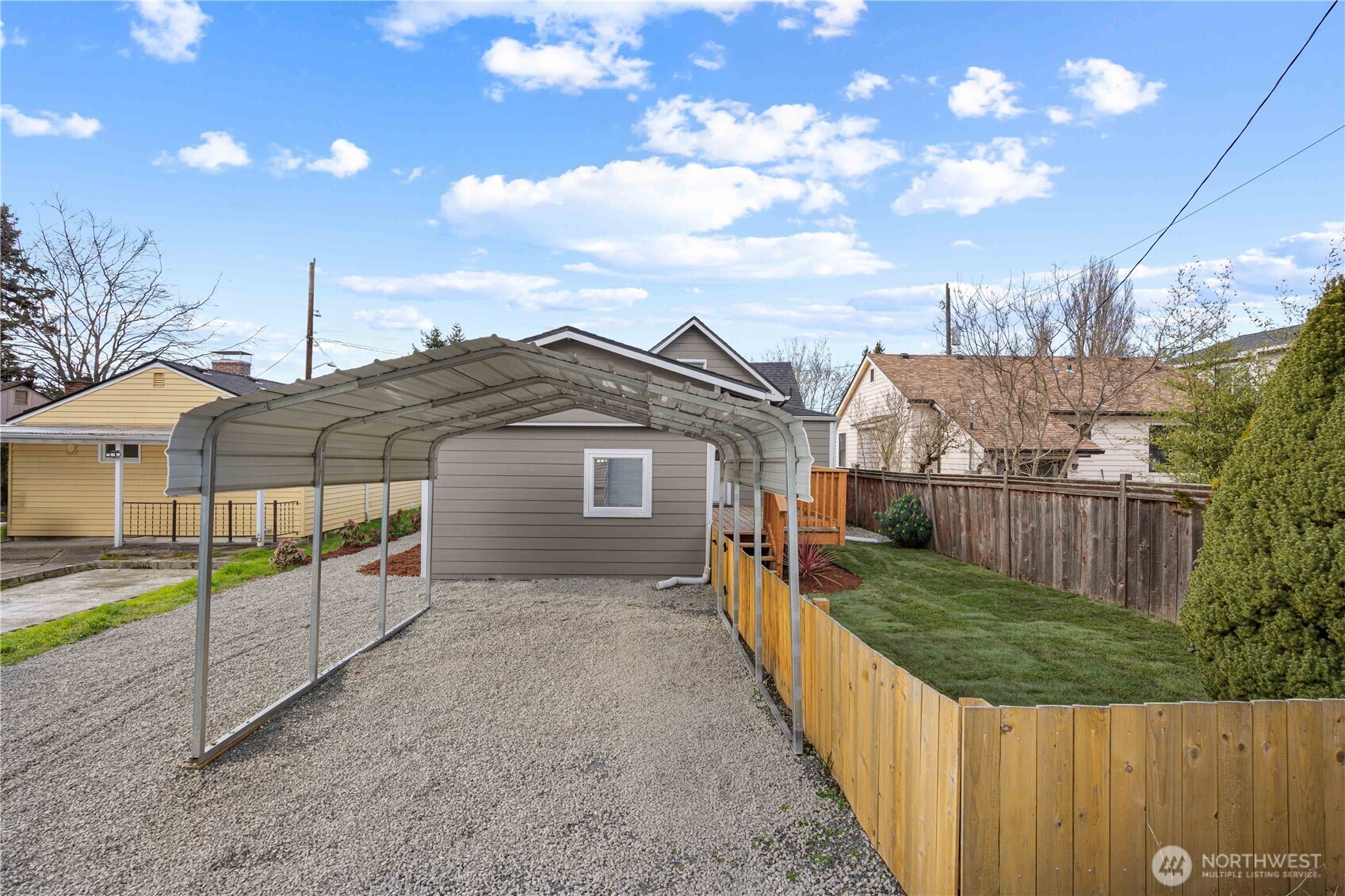 Off the Alley, you have parking for 2 along with a fully fenced  backyard with new landscaping.