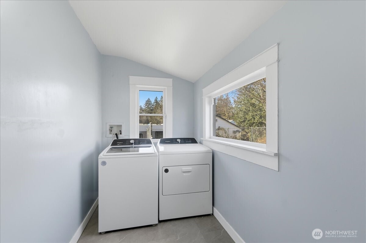 Laundry area secluded from living area but close enough.