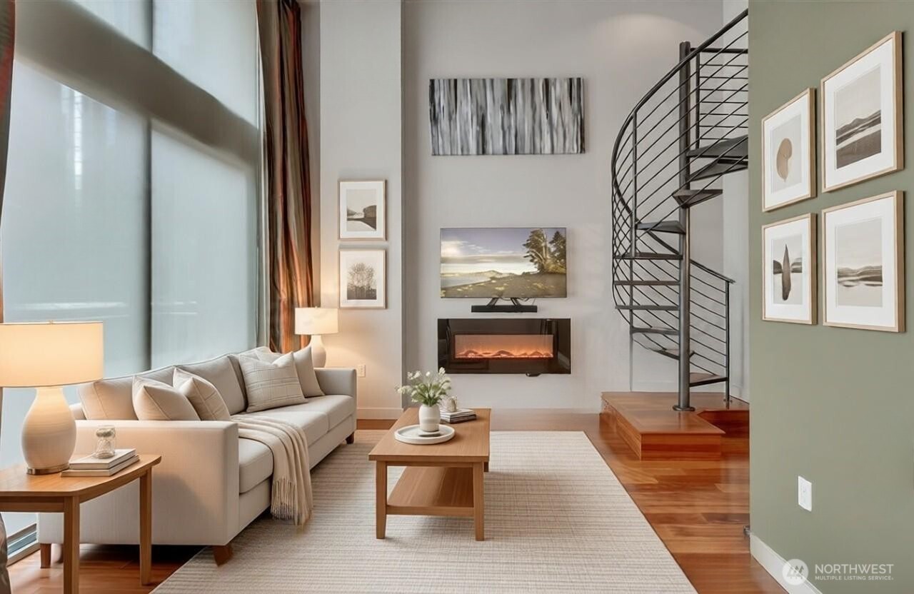 Virtually staged greatroom with high ceilings.