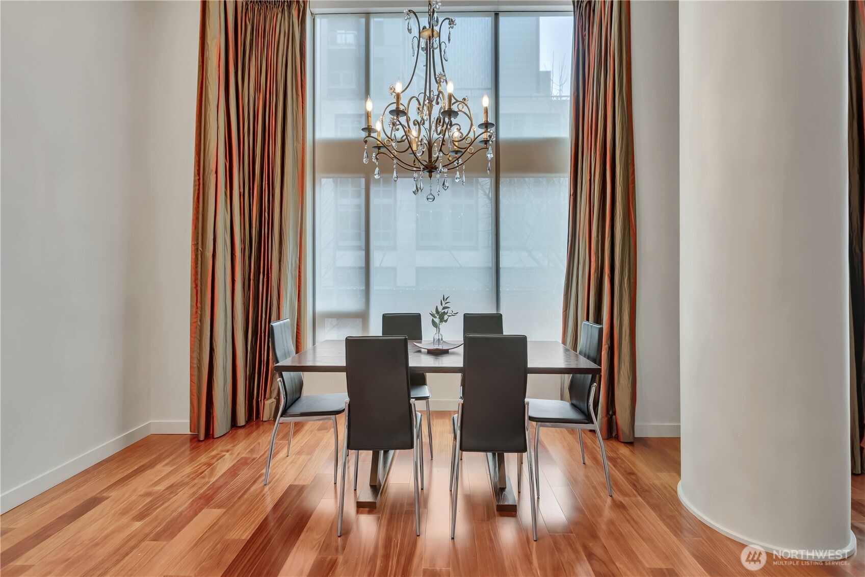 View of dining area with high ceilings.