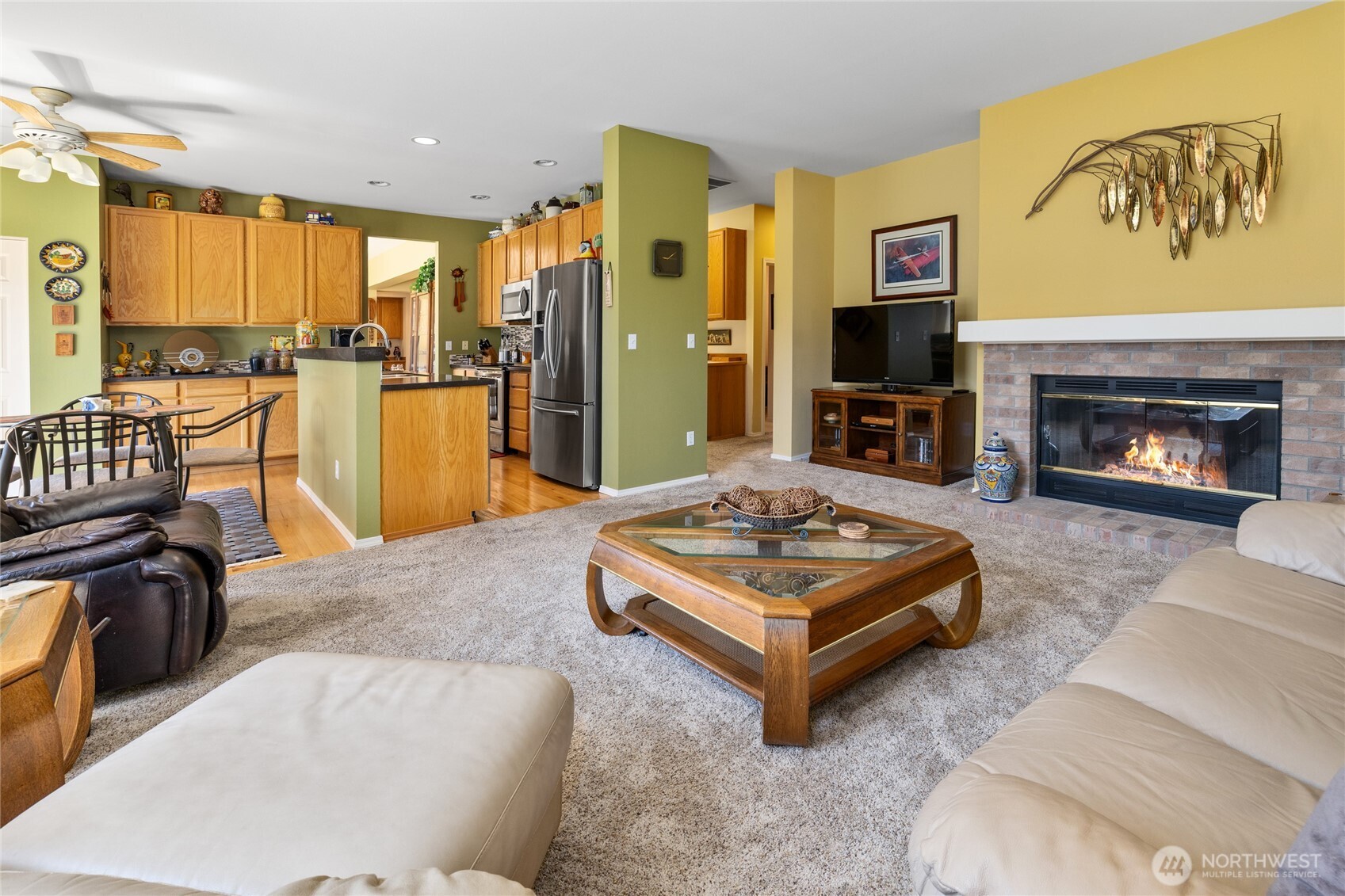 Hallway looking back towards the front entry and primary bedroom, LOOK at all the custom built ins TONS of storage!