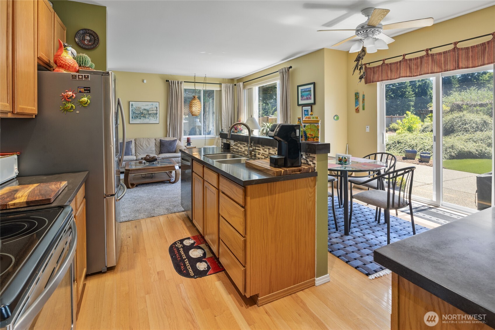 View from eating area back into kitchen and family room.