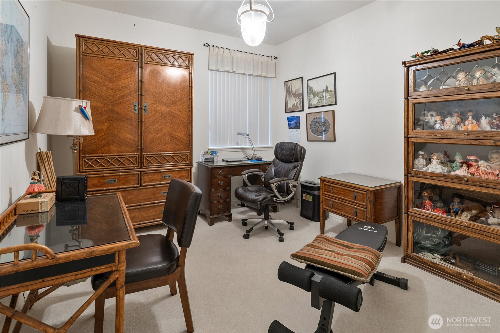 Quartz countertops updated stainless steel appliances and real oak cabinets plus island to provide even more storage.