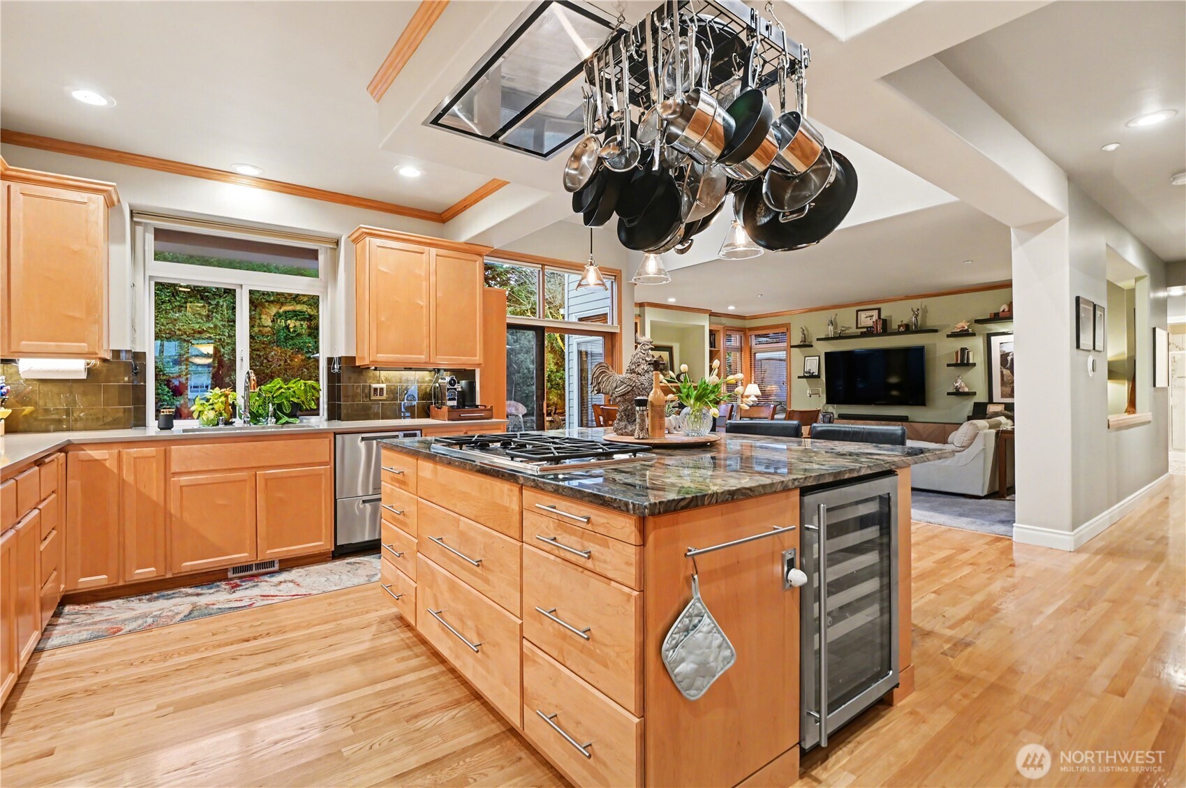 Enjoy connected living with the kitchen open to both the dining area and family room.