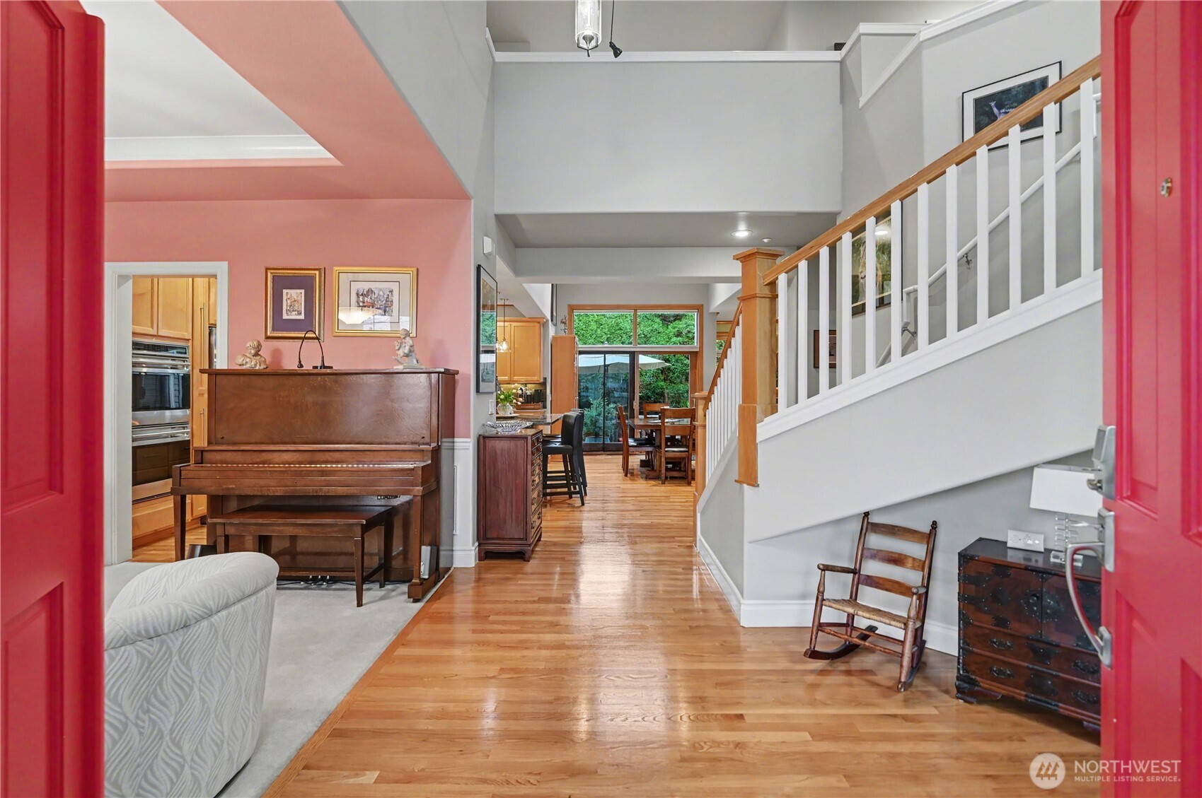 Step inside to a grand entry with vaulted ceilings that immediately sets the tone for the home’s light-filled & elegant design.