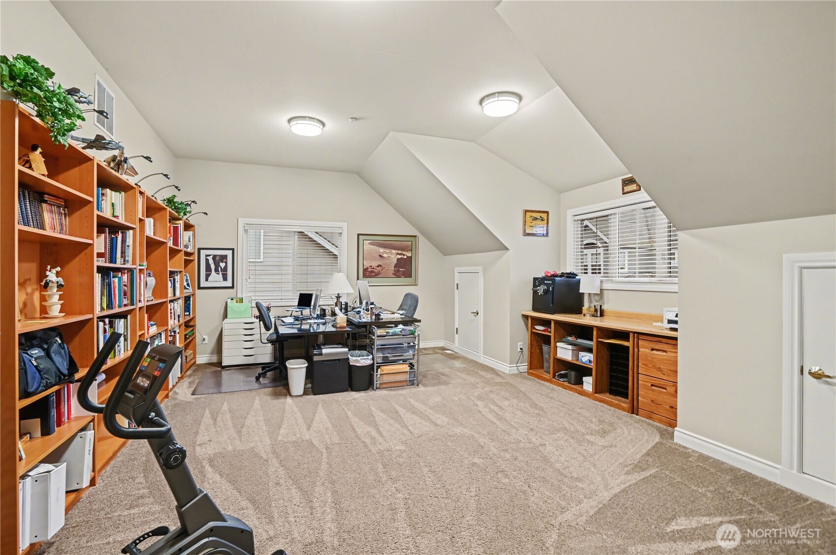 Large bonus room upstairs provides the perfect space for play, media, or relaxation.