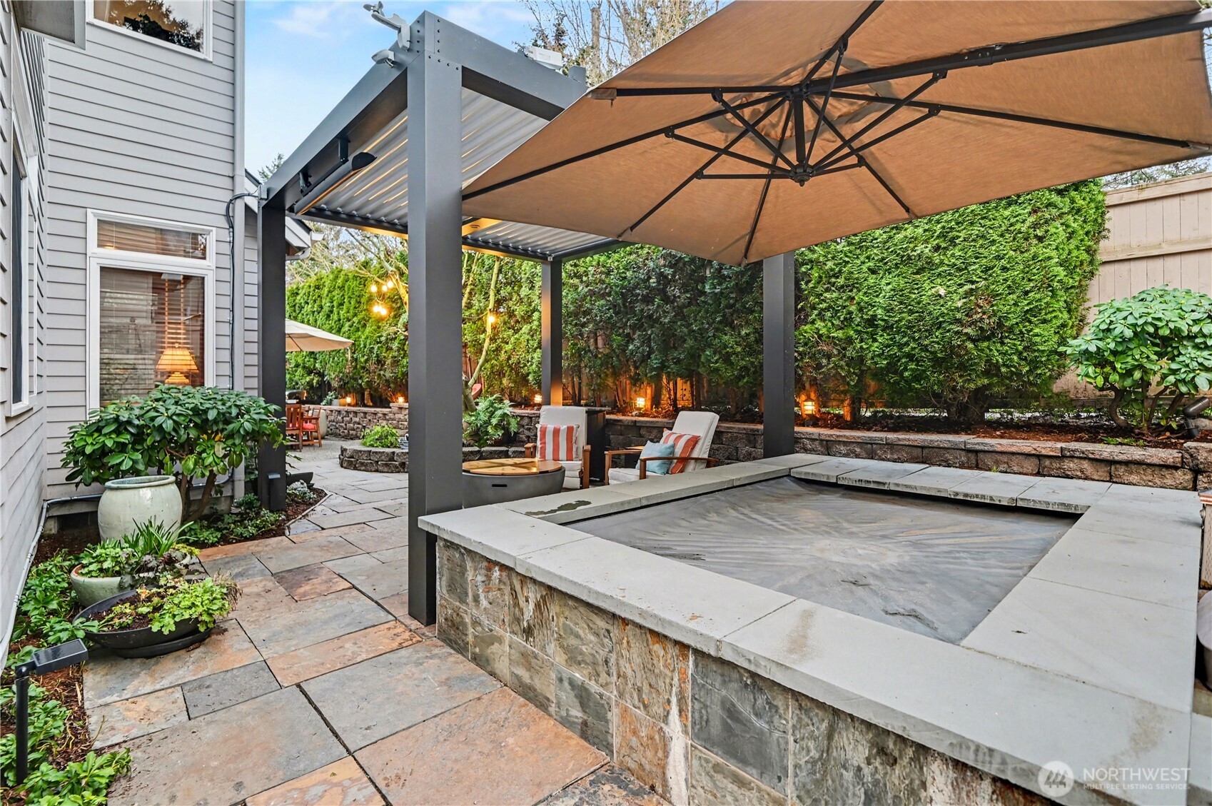 In-ground hot tub provides a spa-like escape at home.