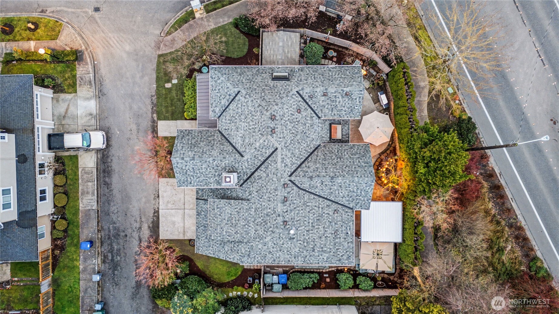 Overhead view provides a comprehensive look at the home and surrounding landscape.