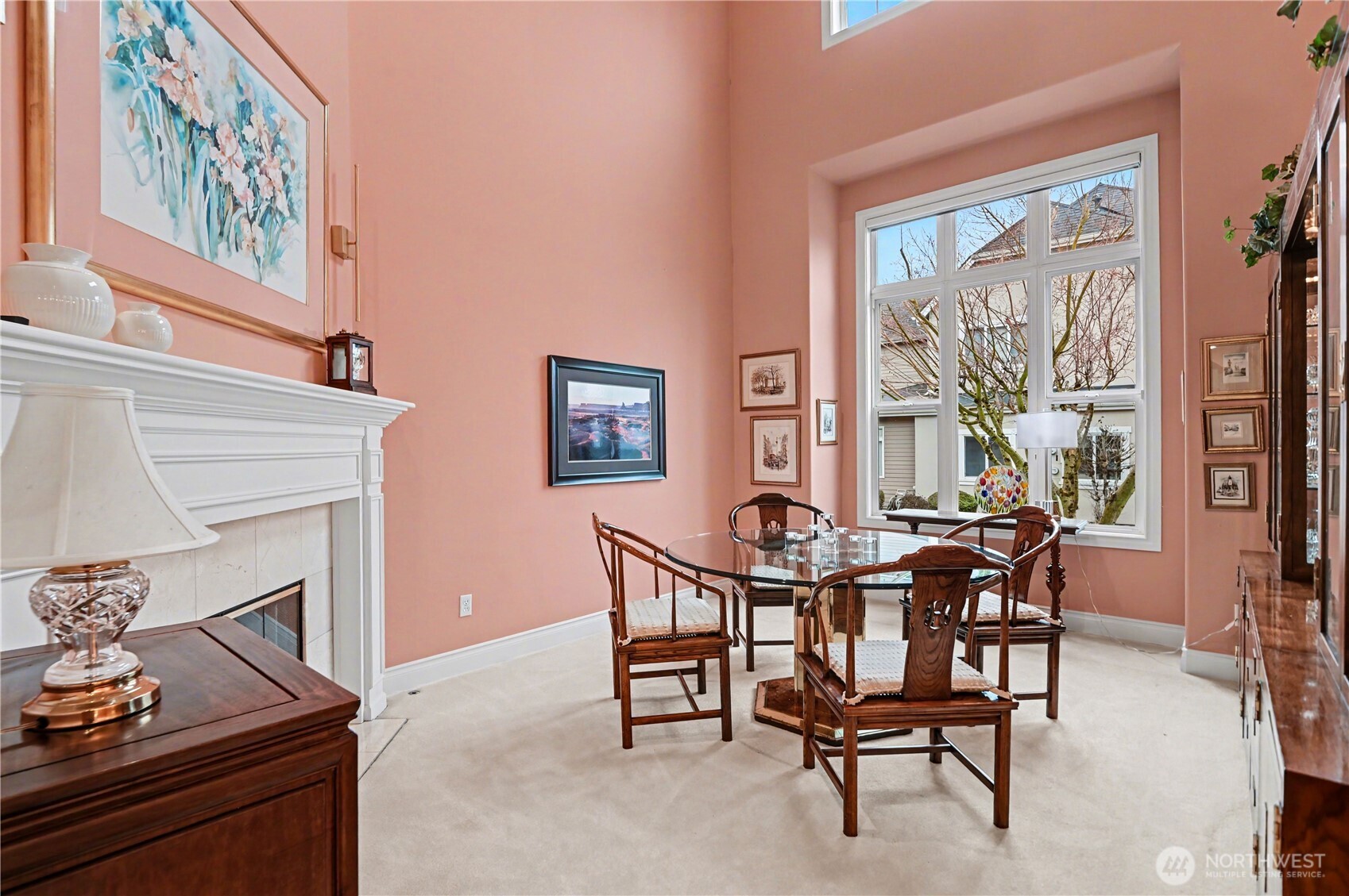 This versatile space, currently being used as a dining room can also be used as an office, studio, or additional living area to suit your needs.