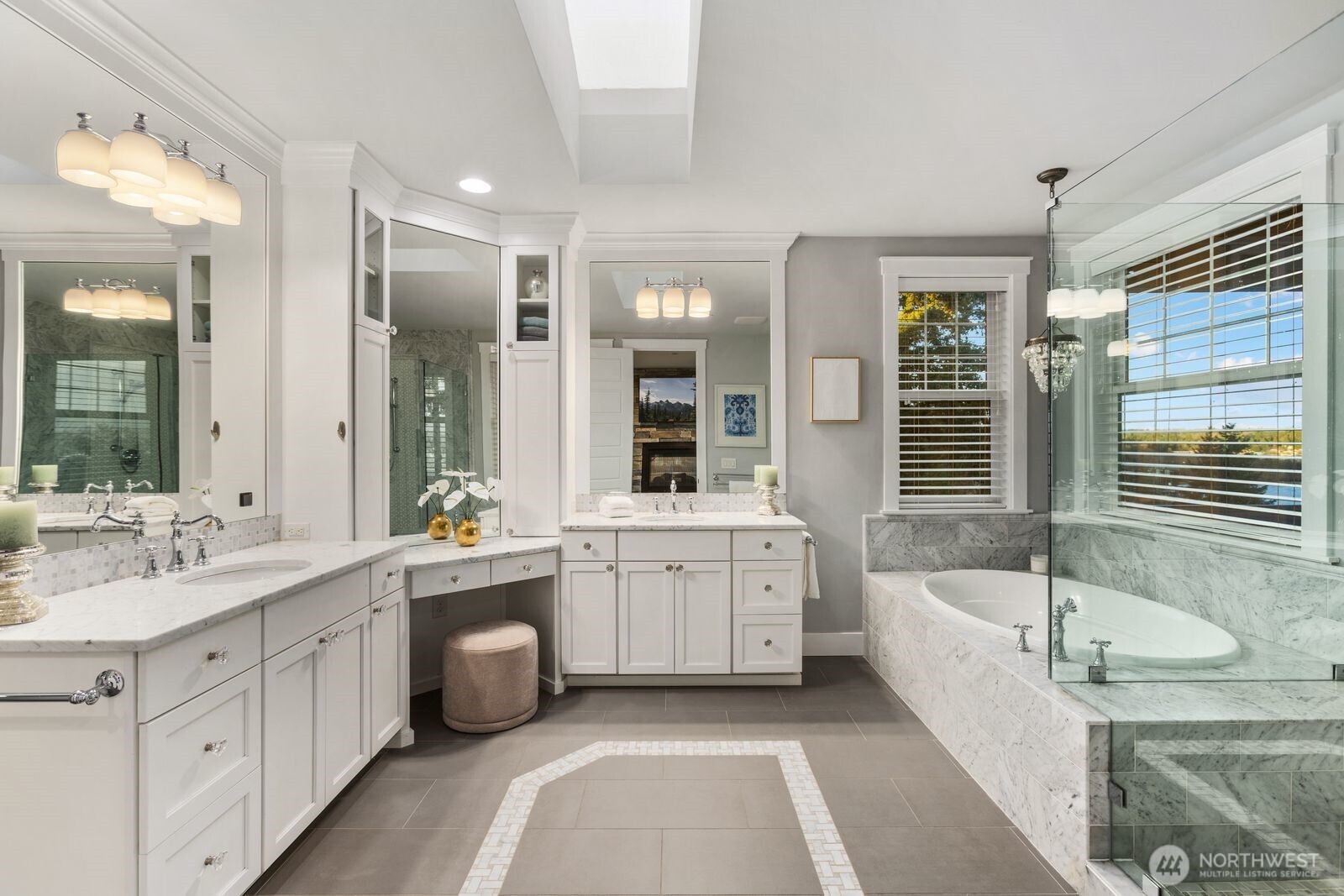 Primary 5 peice ensuite with make up vanity soaking tub, shower