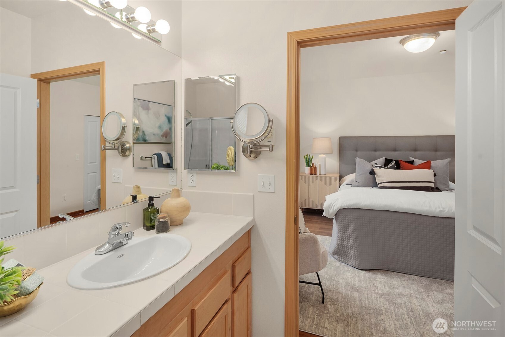 Another view of the primary suite with an en-suite bath