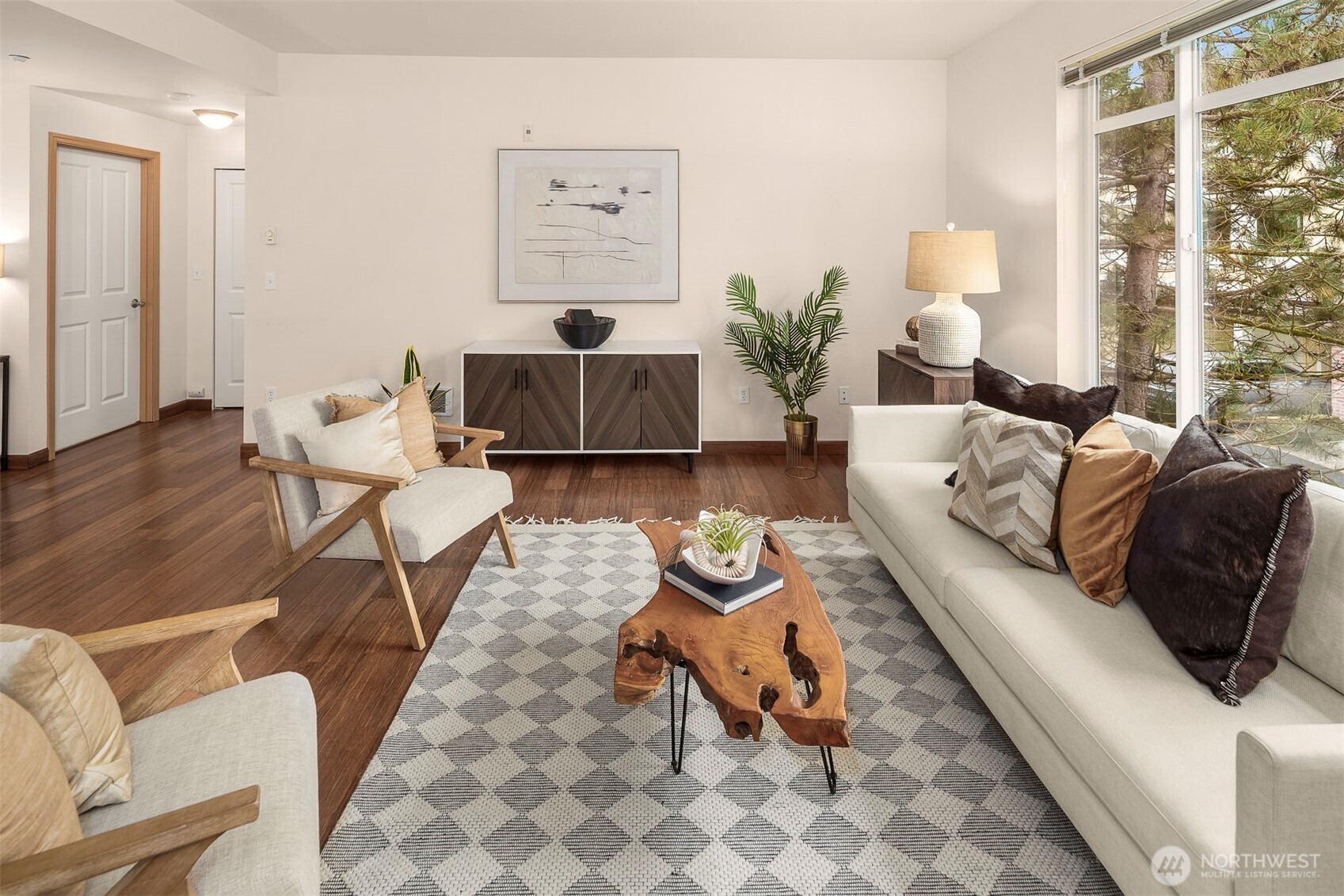 The cozy second bedroom is on the opposite side of the condo from the primary