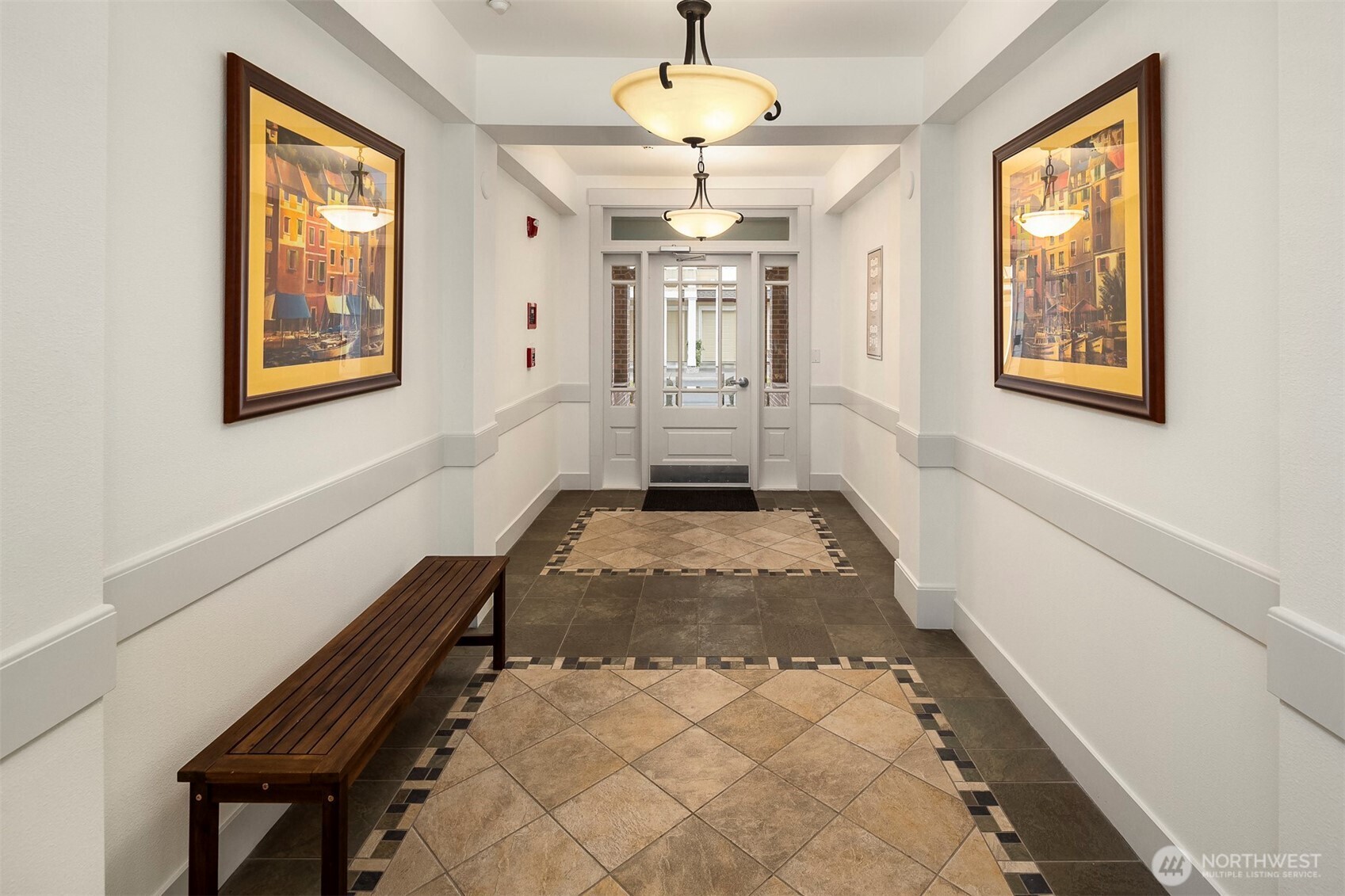 Come right in! Light, bright entry to move-in ready 2bed/2bath end unit