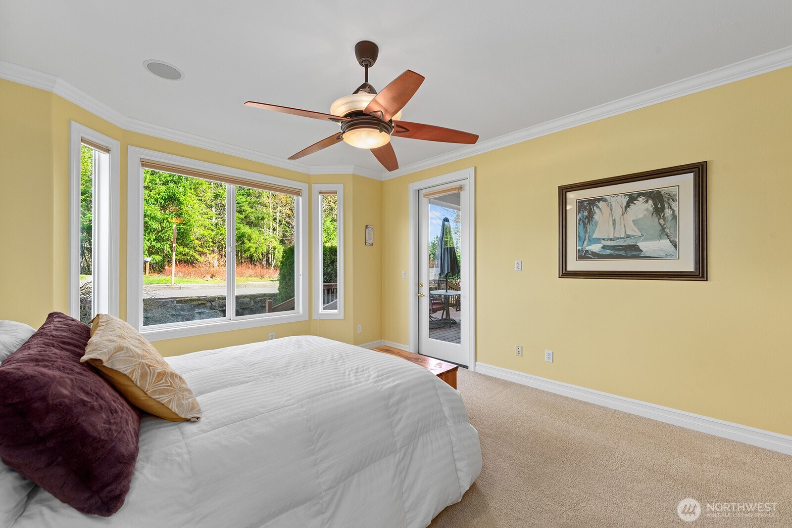 Dining Room features over-sized Skylight.  Small workstation off the dining space in the background.