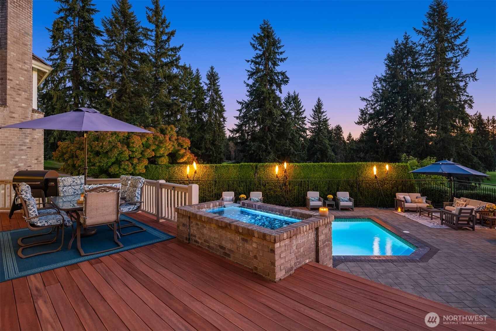 The entertainment-sized deck sits just steps from the magnificent resort-style pool.