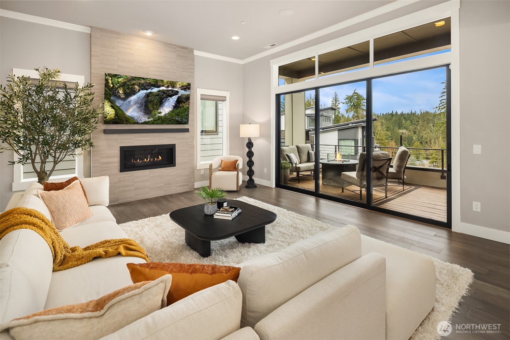 Grand Living space with Stacking Slider opening to the front deck