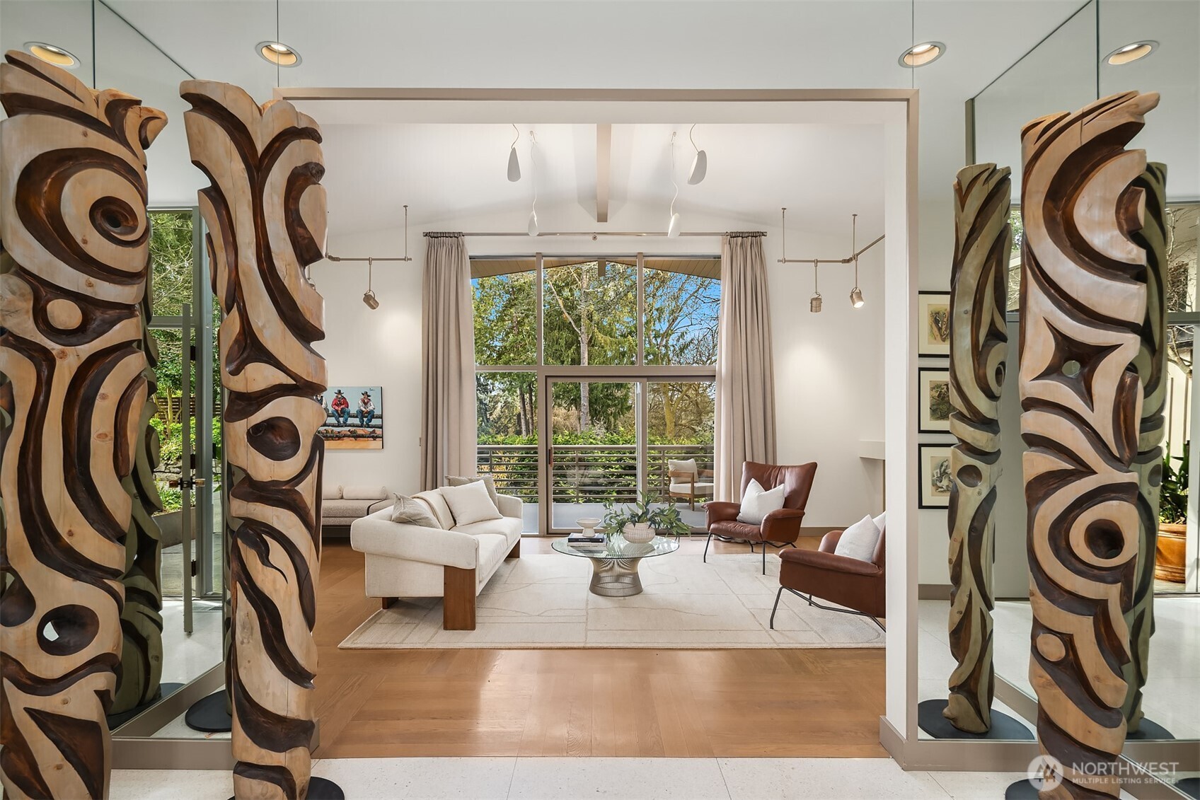 Open the doors to luxurious, light-filled breadth: signature terrazzo floors and soaring walls of glass.