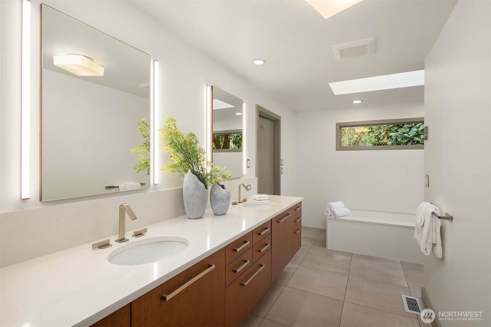 Two closets and an updated five-piece bath make it thoroughly modern.