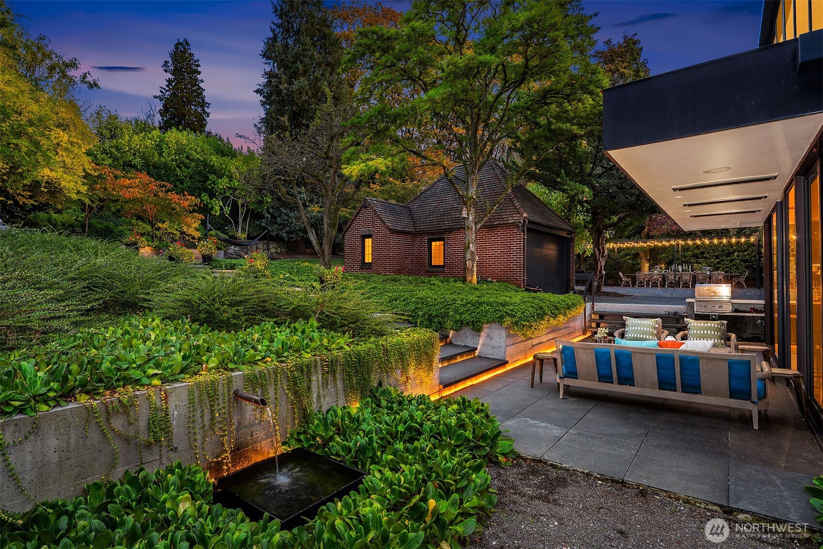 Note the two car garage and the huge Tuscan dining table
