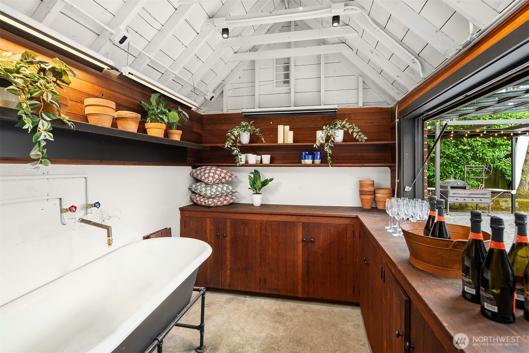 A potting shed reimagined as the perfect outdoor bar