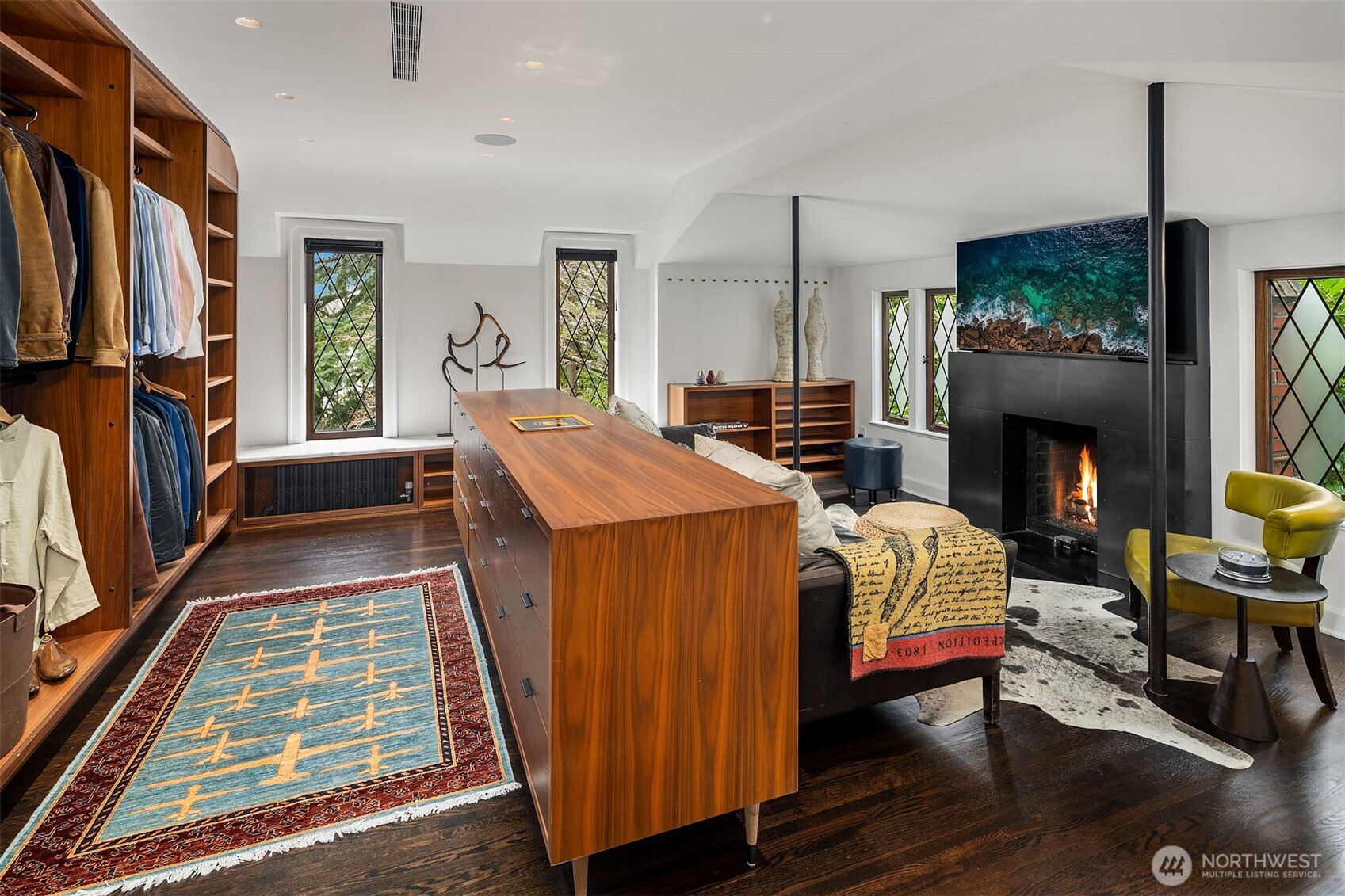 Primary suite dressing room, warmed by a fireplace