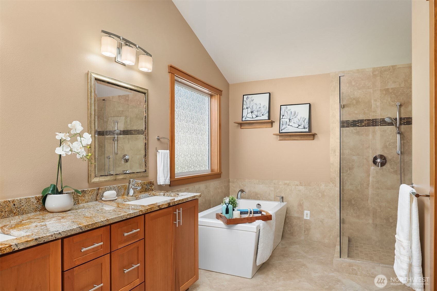 Primary bathroom with separate shower and a soaking tub