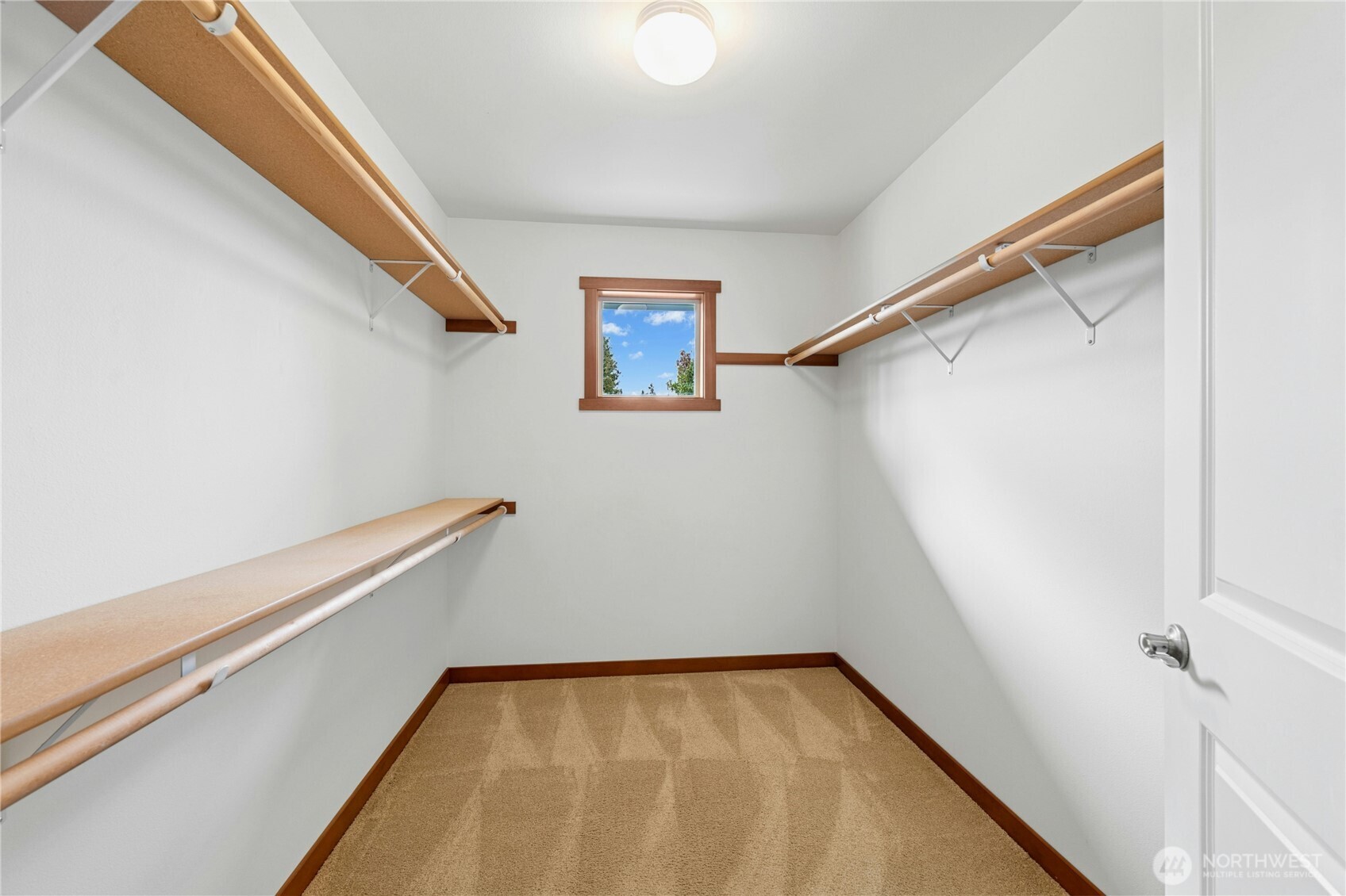 Large walk-in closet in primary bedroom