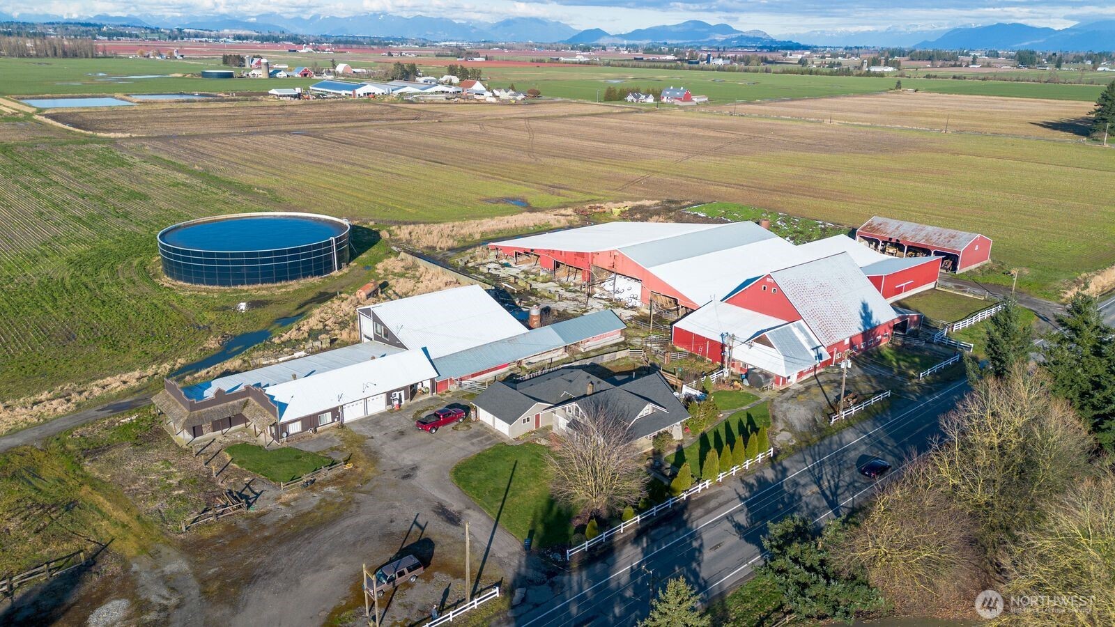 This building has box stalls and potential additional living space.