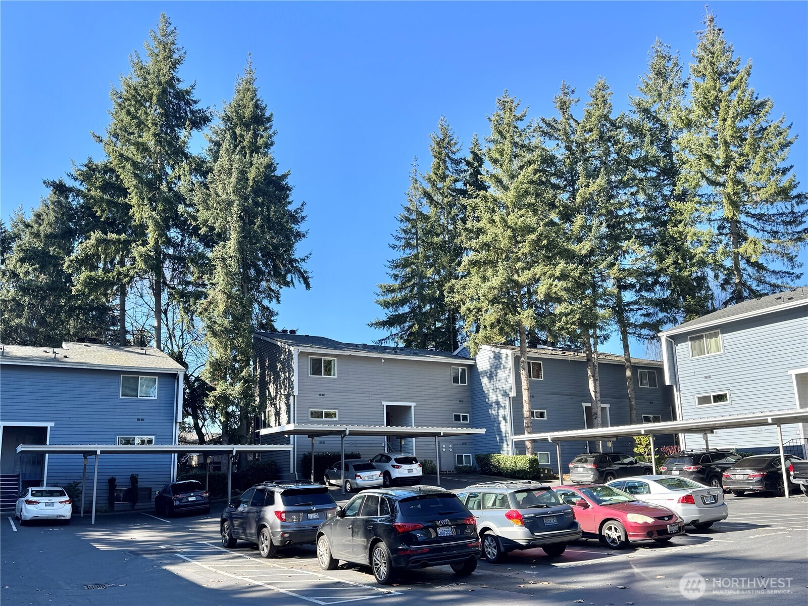 2nd floor laundry w/ full sized washer & dryer with ample storage above for linens