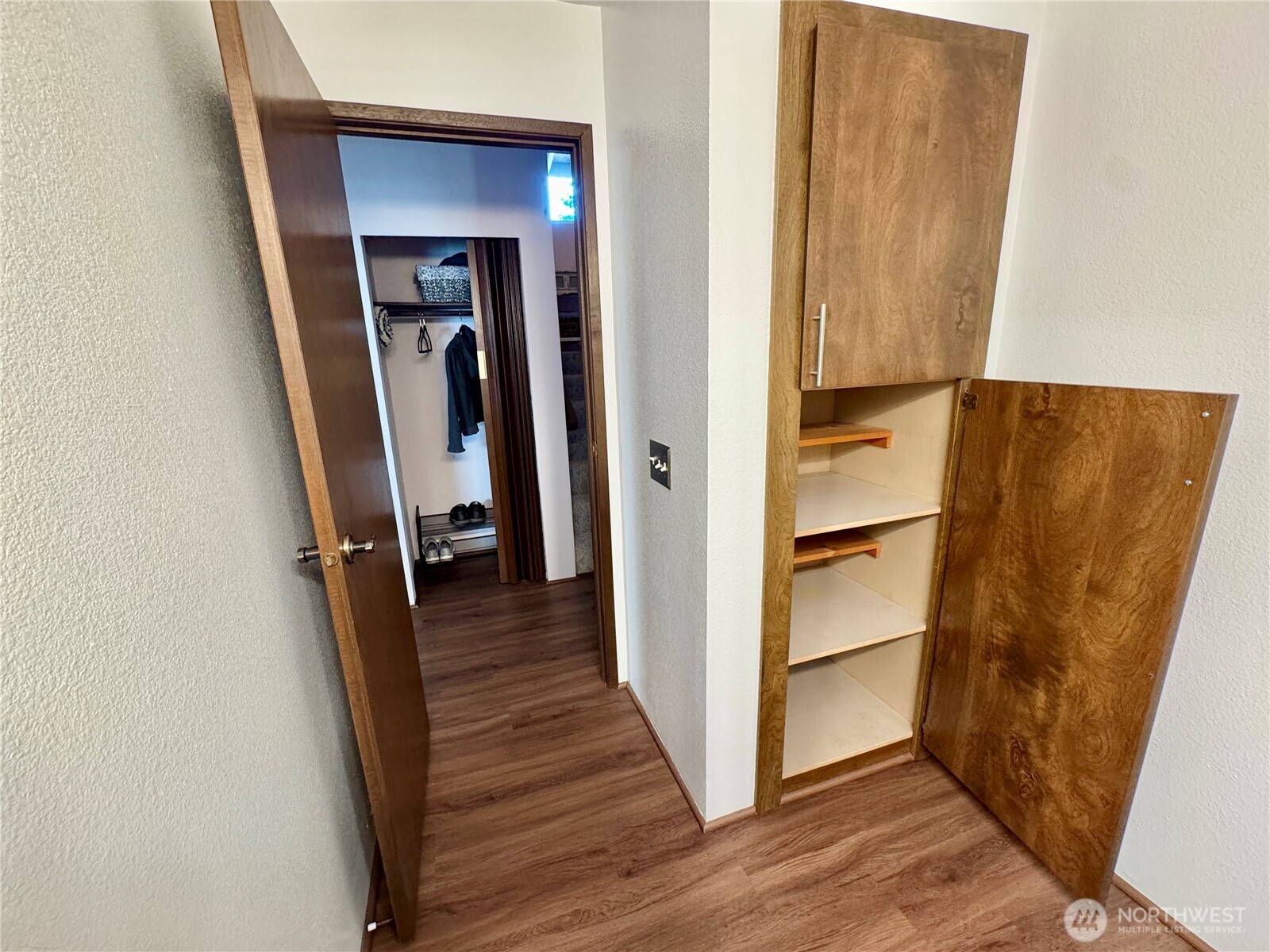 Bedroom 2, with deep custom built shelving