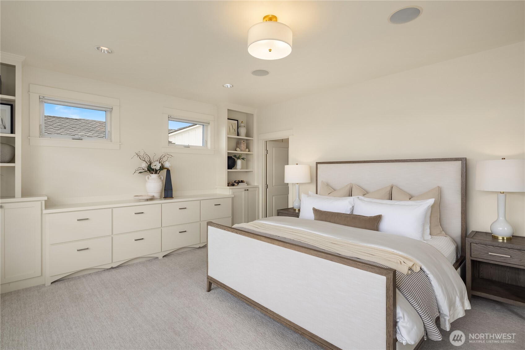 Primary Suite with wall of built-in dressers