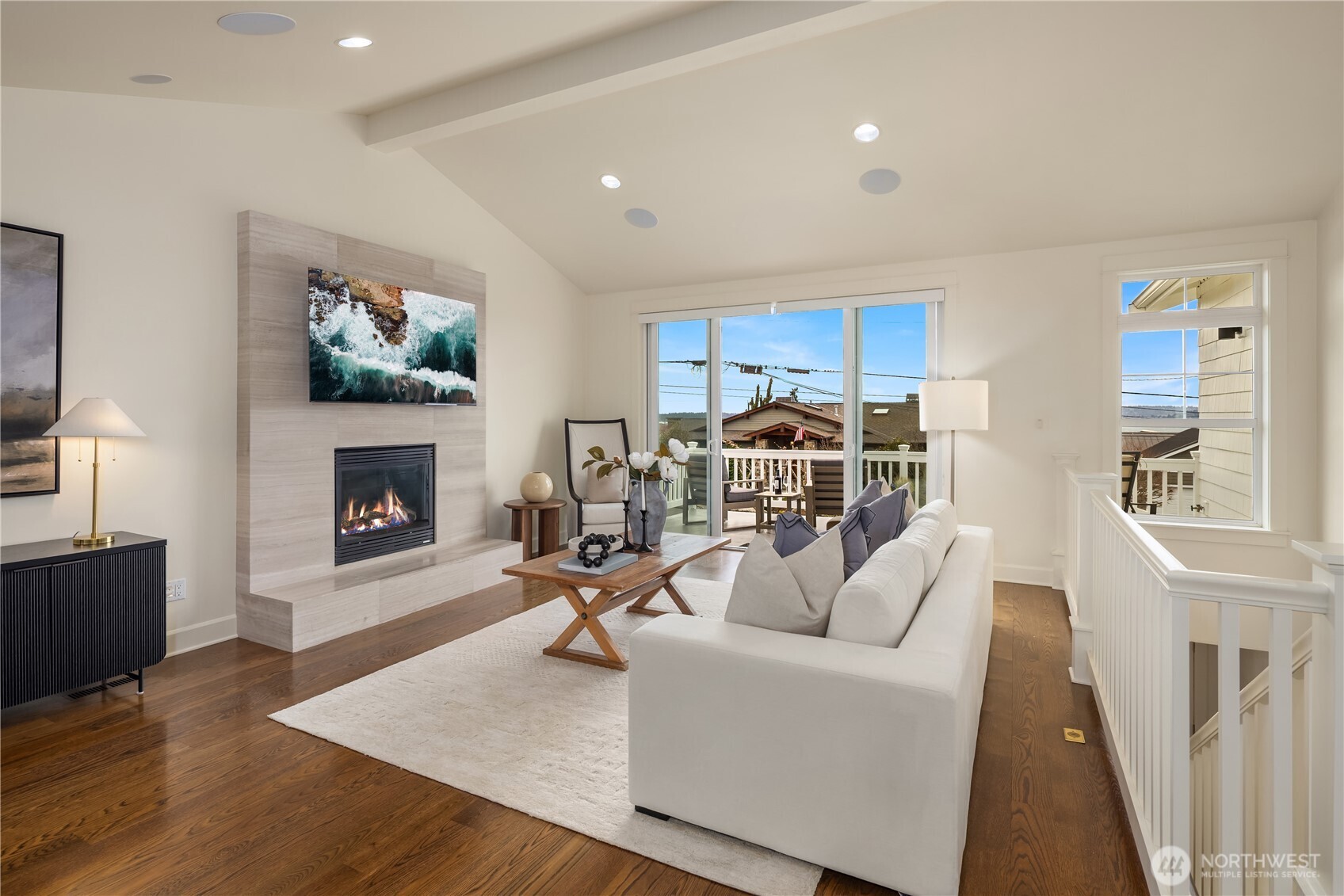 Great room with views, gas fireplace and access to front deck