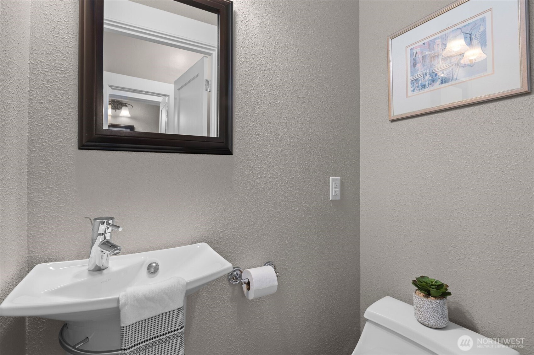 The half bathroom downstairs.