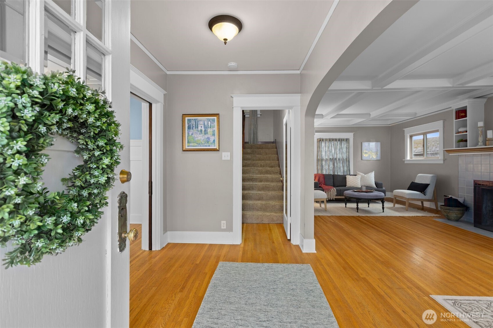 Upon entering the home, you are greeted with the boxed beam ceiling.