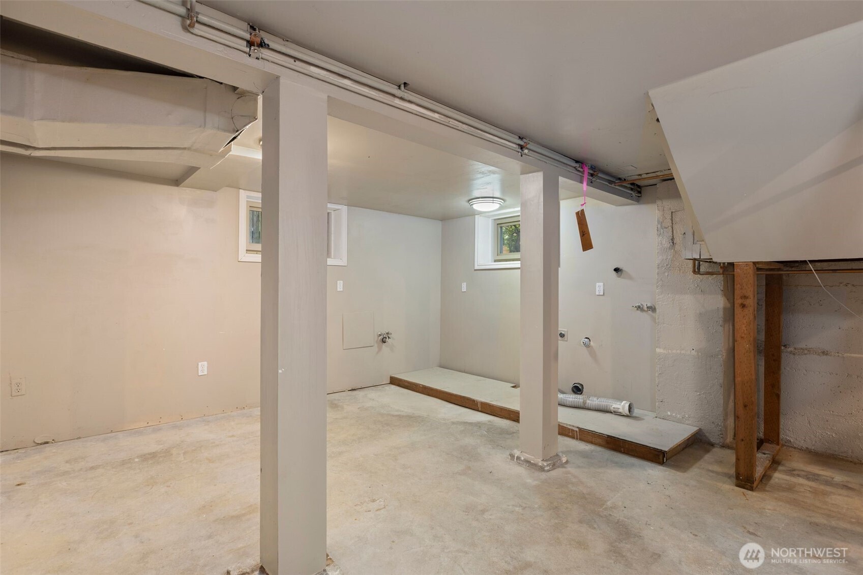 Downstairs you have space for storage, and a washer and dryer.