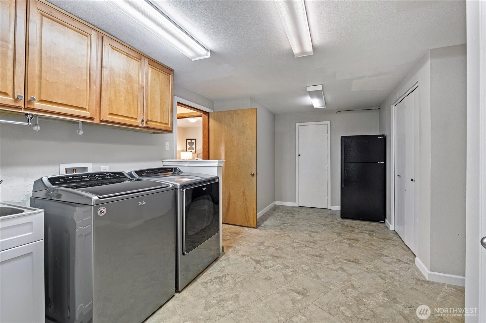 Large Laundry room plenty of storage basement
