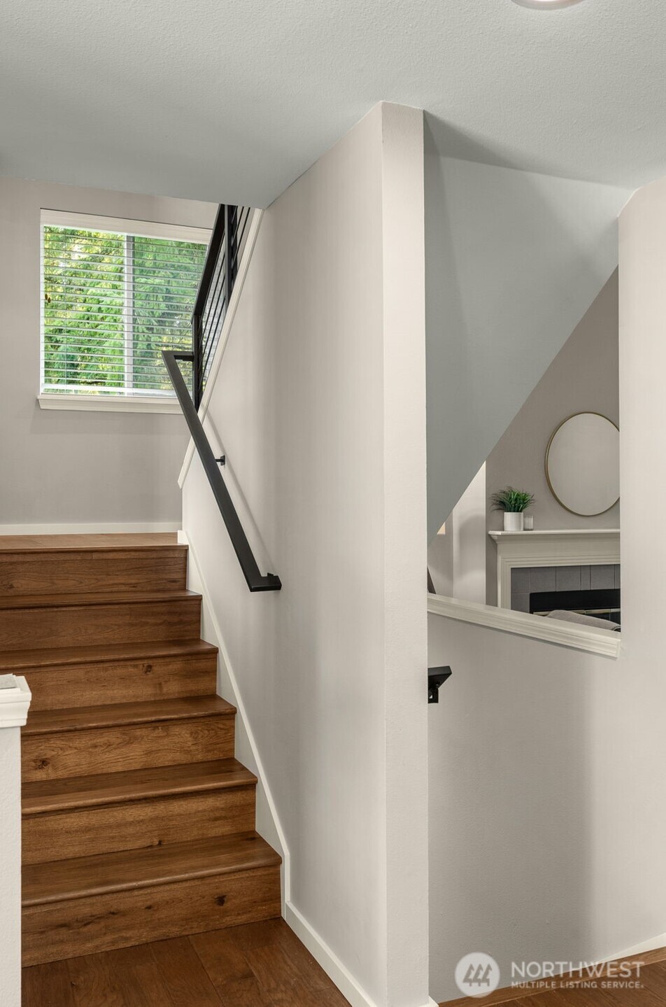 Rich hardwoods throughout the home