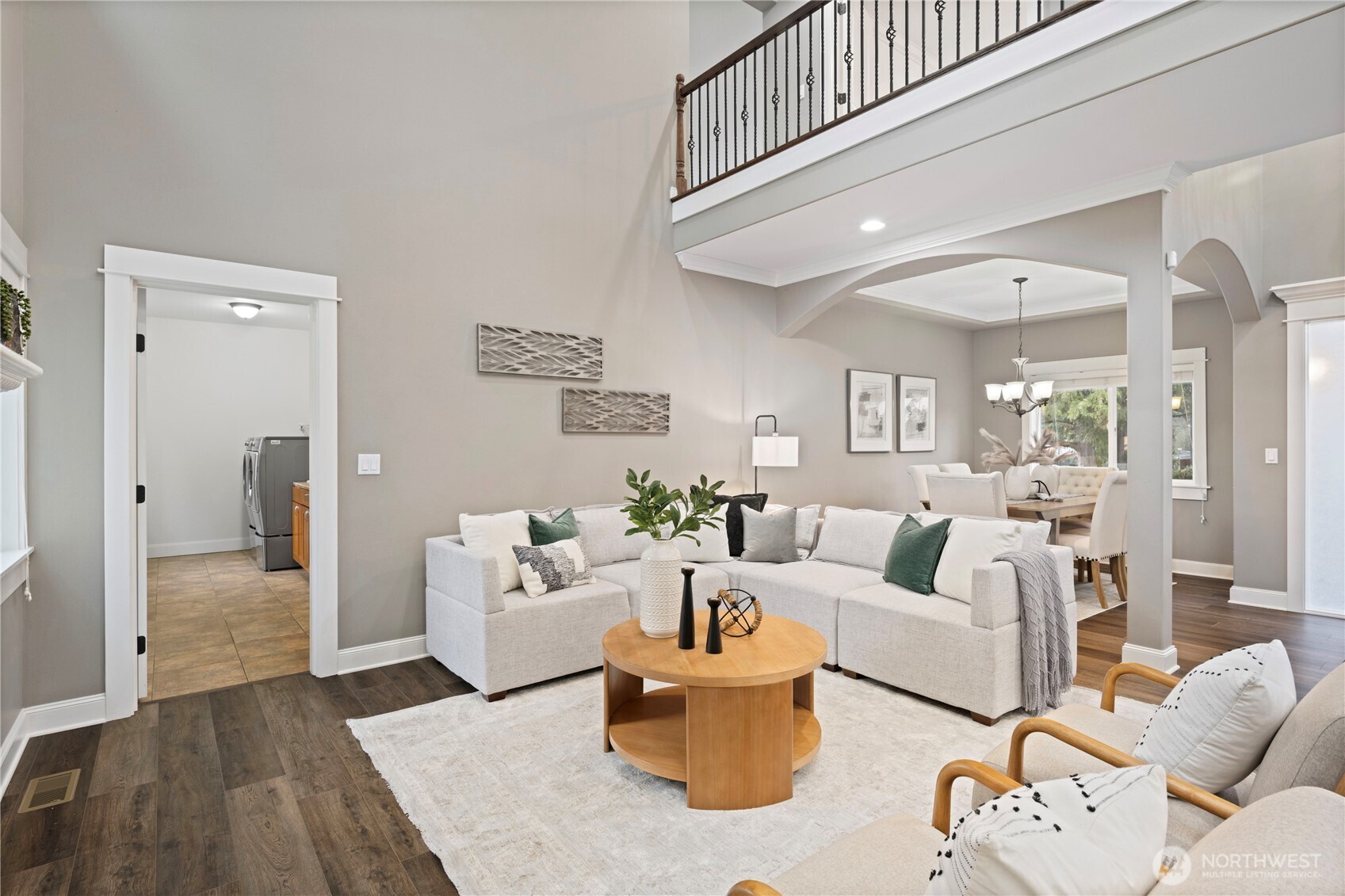 Another view of the primary suite bath with heated floors, separate tub and walk-in shower.