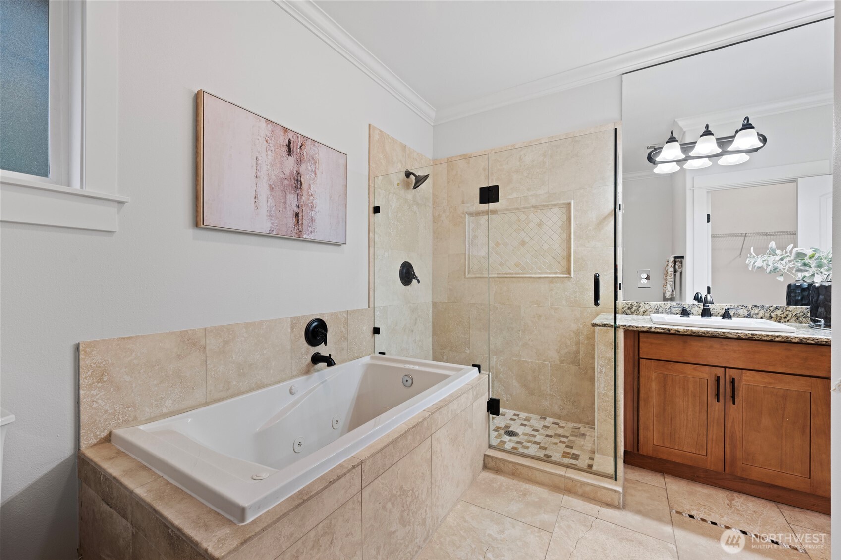 Another view of the kitchen, sink with large window, and French doors to the back yard.