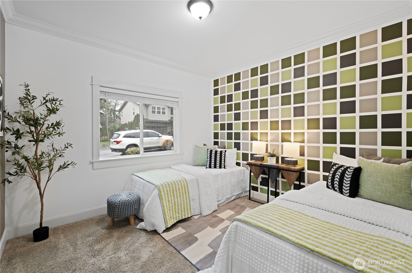 Looking out to the back yard that is fully fenced and south facing for maximum sunlight throughout the day.