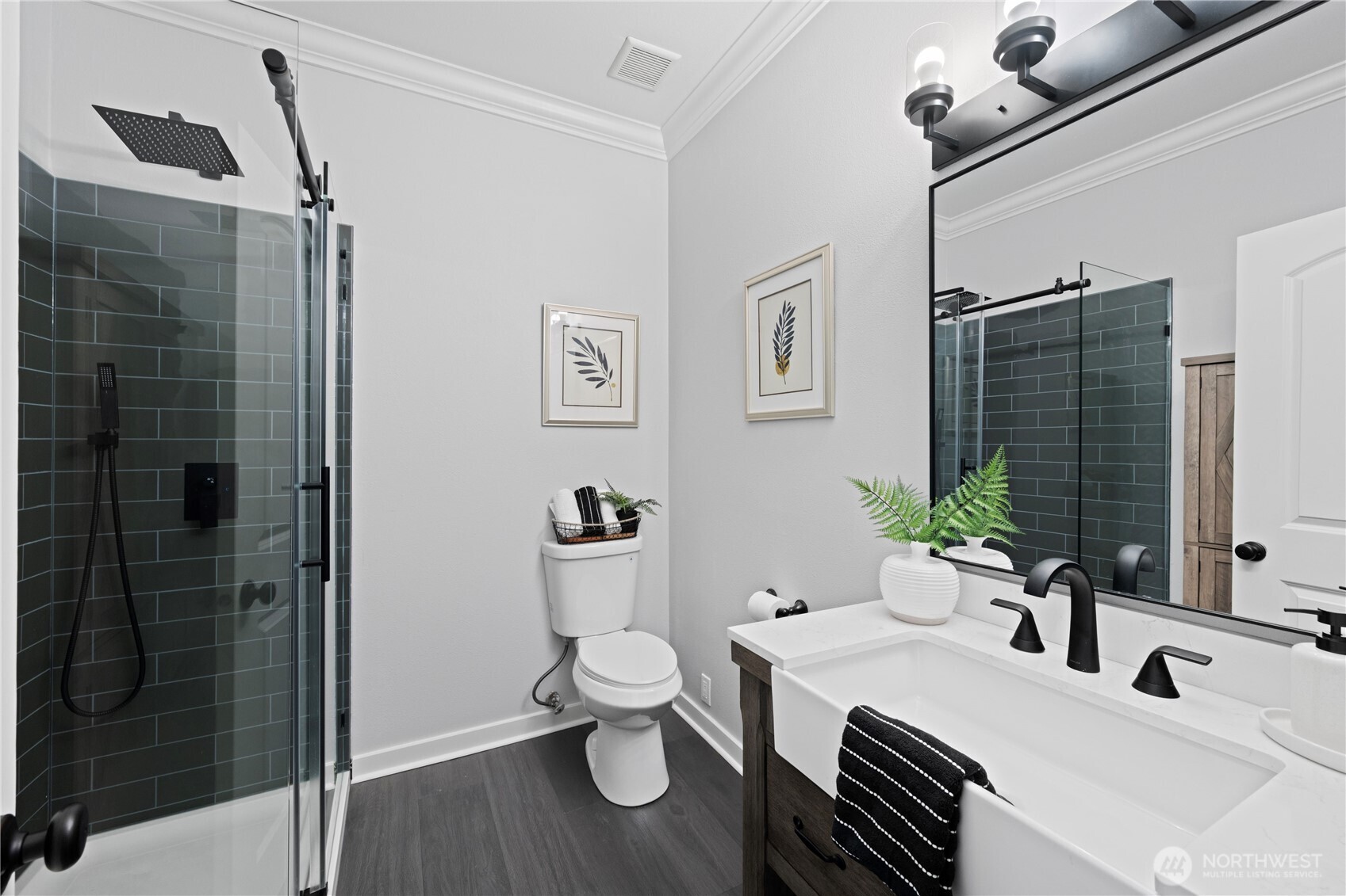 Upper level full bath with double vanities.