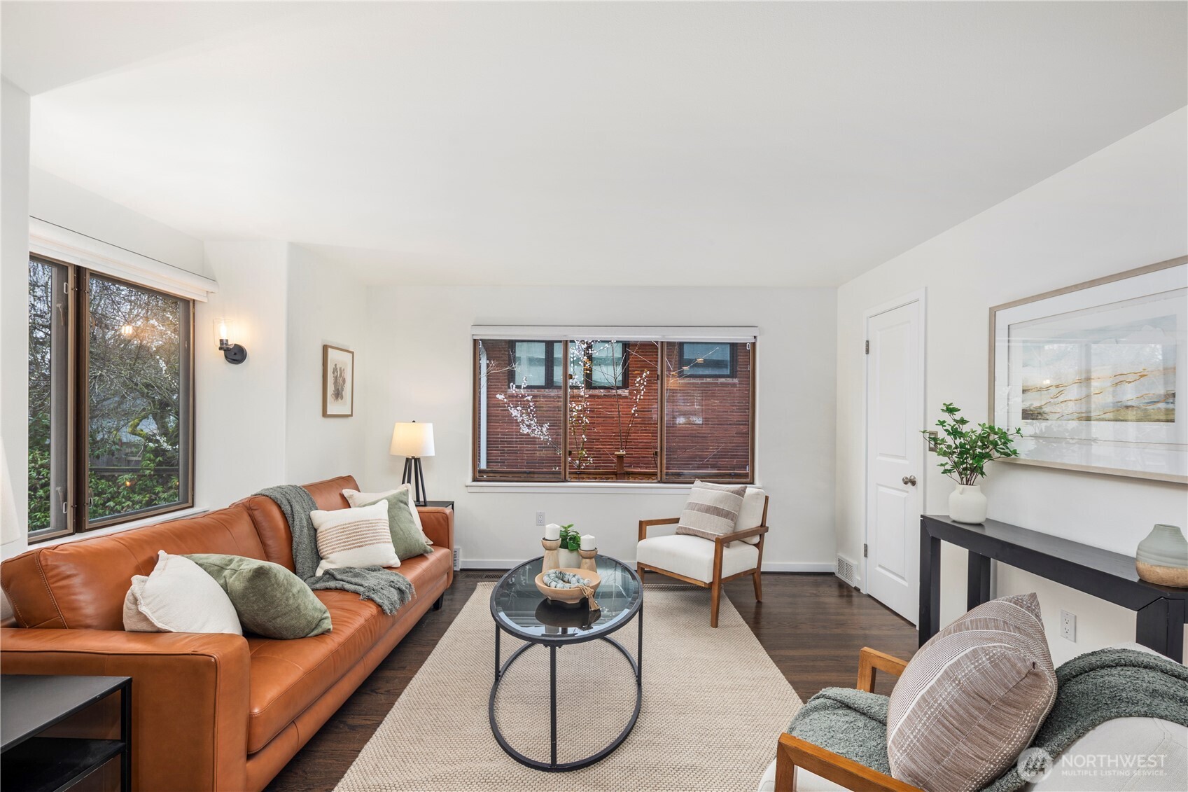 The inviting family room just off the kitchen creates a seamless gathering space perfect for everyday living and entertaining.