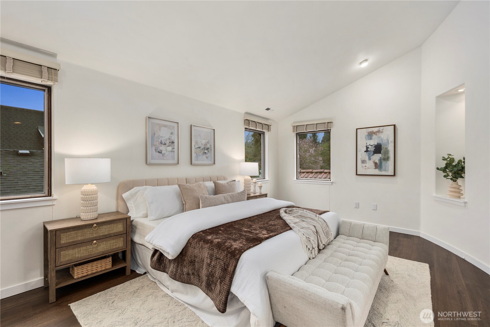 Sumptuous primary suite featuring a spacious walk-in closet and luxurious five-piece bath with soaking tub.