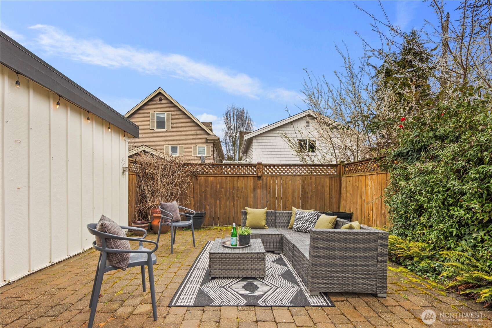 Private backyard provides an inviting setting for outdoor entertaining, dining al fresco, or simply relaxing in the tranquil surroundings.