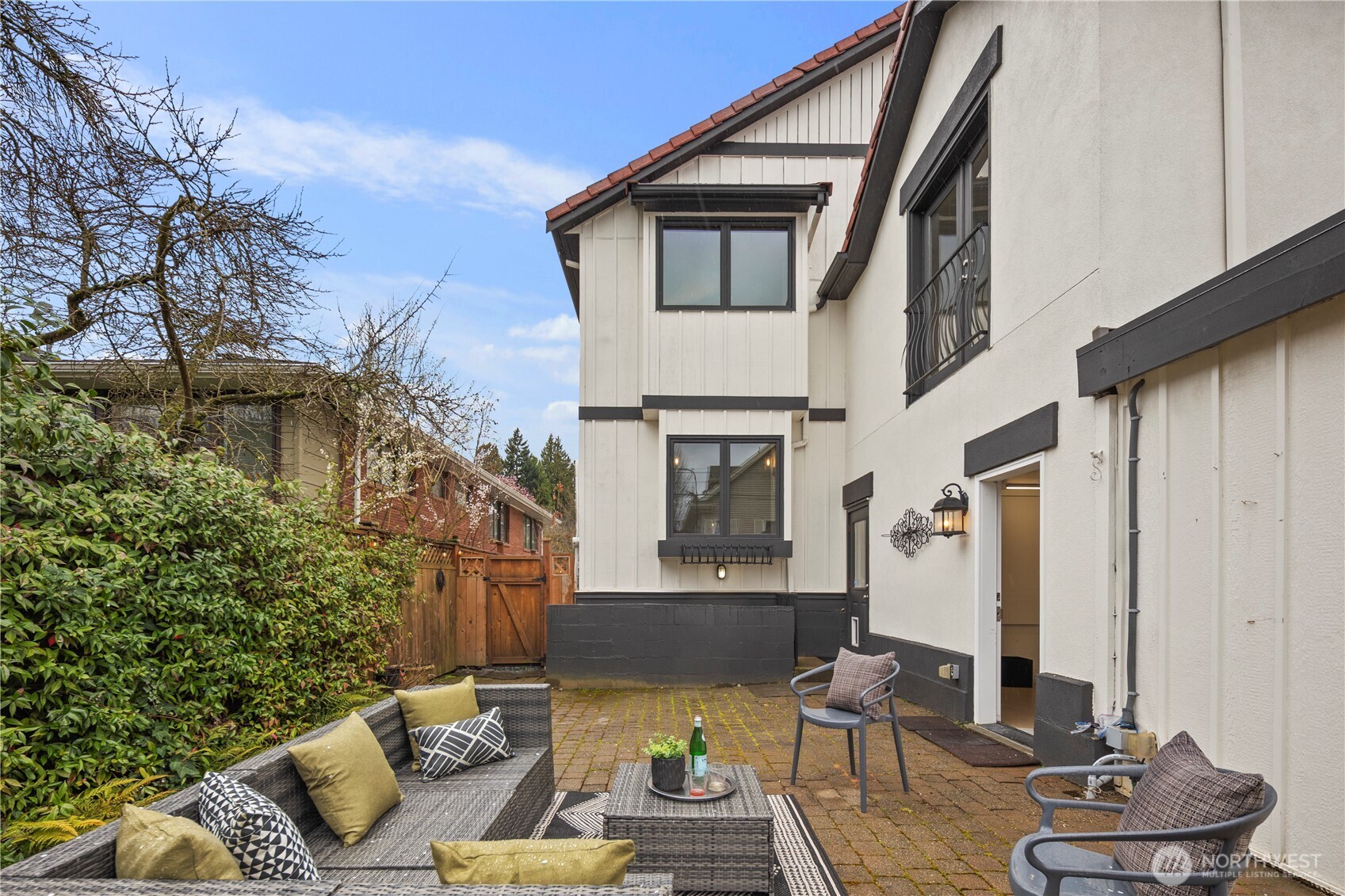 Private backyard provides an inviting setting for outdoor entertaining, dining al fresco, or simply relaxing in the tranquil surroundings.