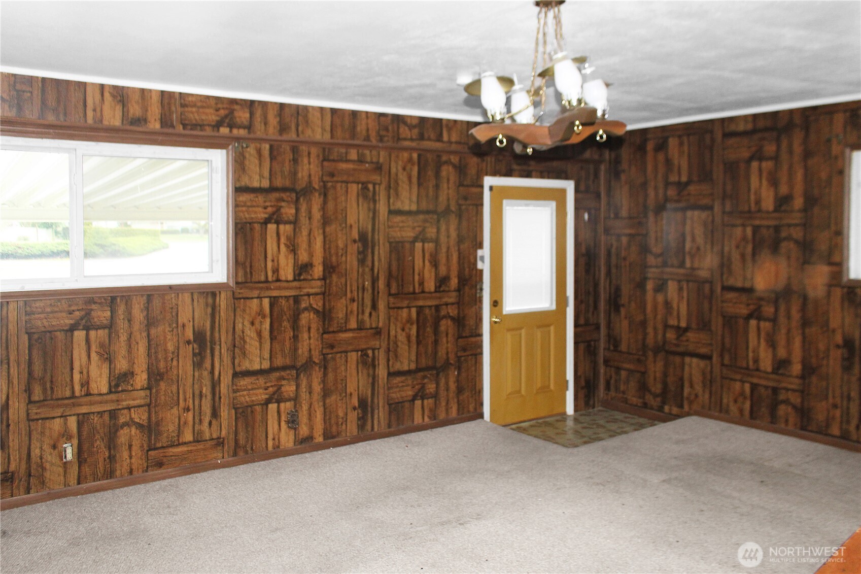recreation room and door to carport