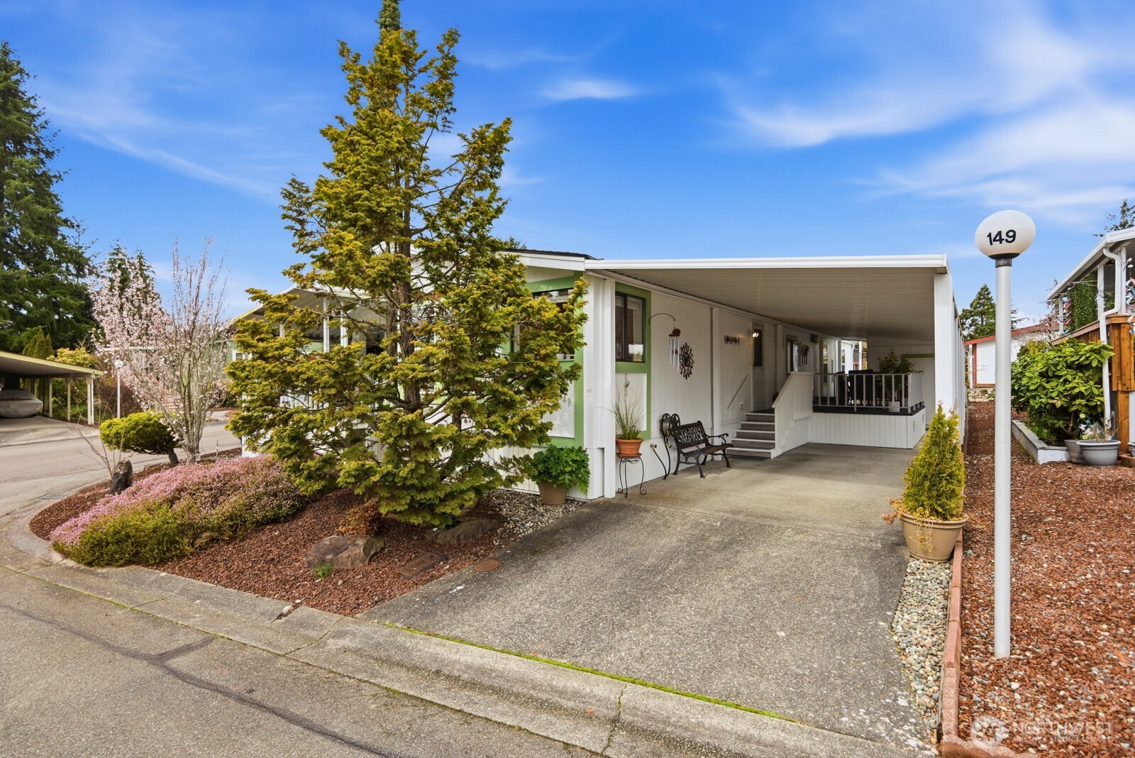 Spacious driveway and carport